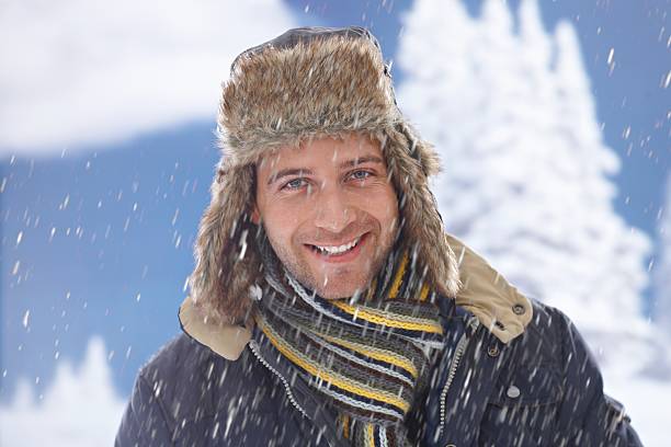 istock Winter portrait of happy man 451937219