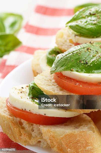 Caprese Sandwiches With Mozzarella Stock Photo - Download Image Now - Appetizer, Basil, Bread