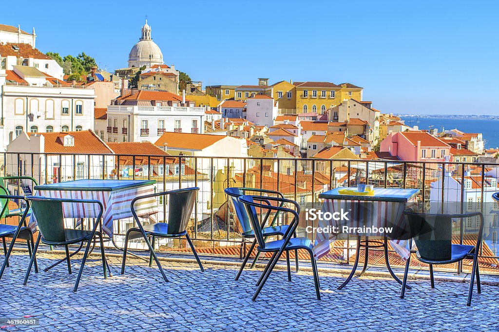 Open café tarrace in Lisbon Open café tarrace with breathtaking view at Alfama - historical city-center of Lisbon, Portugal Lisbon - Portugal Stock Photo