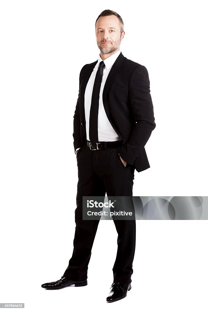 Standing Businessman Full lenght of a standing businessman isolated on white. Active Seniors Stock Photo