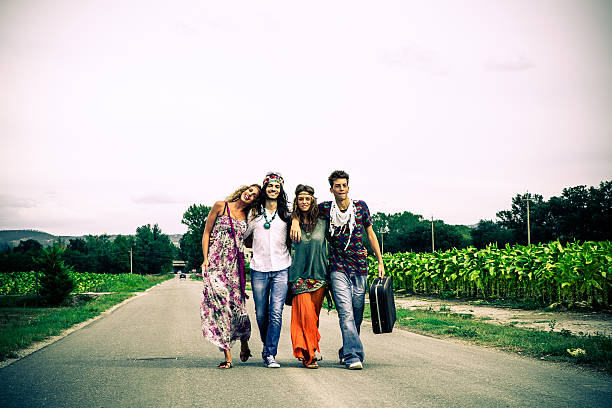 istock Young Hippies Portrait Walking on Street 451965131