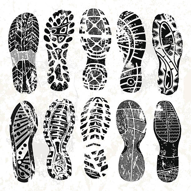 Grunge shoe tracks Collection of highly detailed grunge foot prints: shoe print stock illustrations