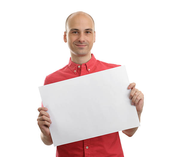istock Man Holding Blank Paper Over White Background 451967315