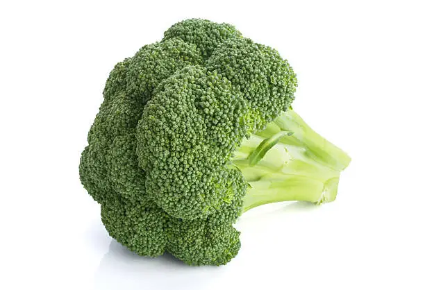 Fresh broccoli in closeup, isolated on white background