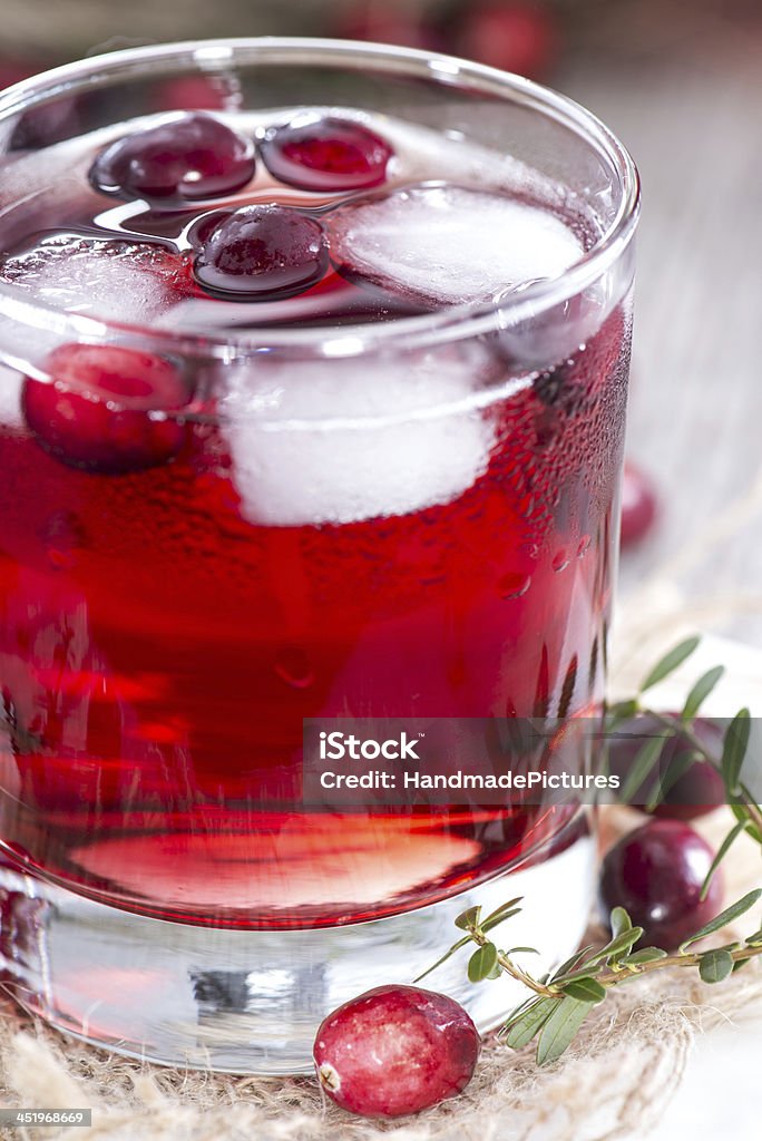 Glass with Cranberry Juice Glass with Cranberry Juice and Ice Cubes Berry Stock Photo