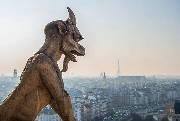 A gargoyle in Notre Dame's Cathedral in Paris, France.
