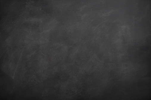 Blank blackboard with traces of erased chalk