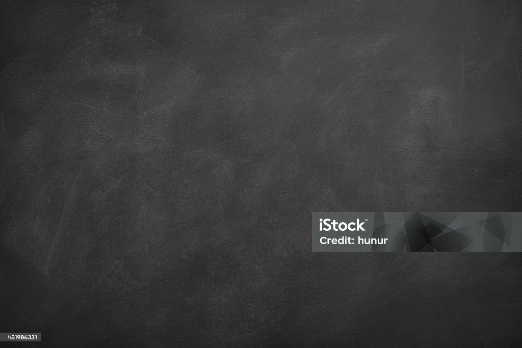 Blank blackboard with traces of erased chalk Blank blackboard for background image Chalkboard - Visual Aid Stock Photo