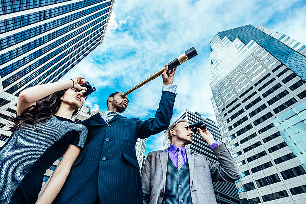 Business Opportunities Business team with spyglass and binoculars looking for new opportunities. pursuit concept stock pictures, royalty-free photos & images