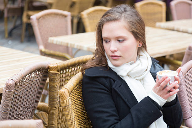 istock Pensive woman in cafe 451993525