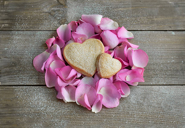 istock heart shaped cookies on rose petals 452018839