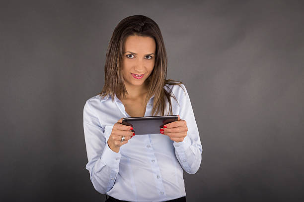 istock Business woman holding tablet computer 452023989