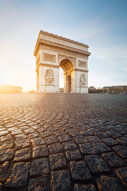Arc de Triomphe, Paris Sunrise at Arc de Triomphe, Paris (France) arc de triomphe paris stock pictures, royalty-free photos & images