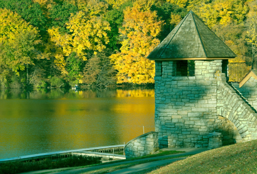 Stone boathouse was built by the CCC in the 1930s where the Maquoketa River is impounded to a lake and reservoir in Backbone State Park in northeastern Iowa