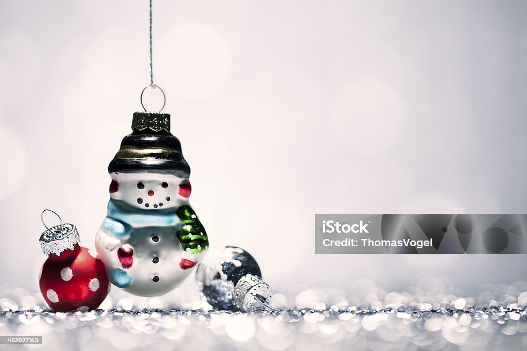 Decoración de Navidad muñeco de nieve de invierno oro Bokeh Bauble Glitter - Foto de stock de Adorno de navidad libre de derechos