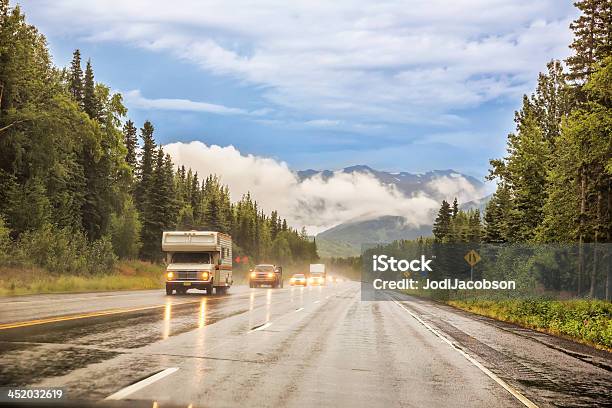 Vehicles Driving On A Scenic Highway In The Rain Stock Photo - Download Image Now - Motor Home, Rain, Car