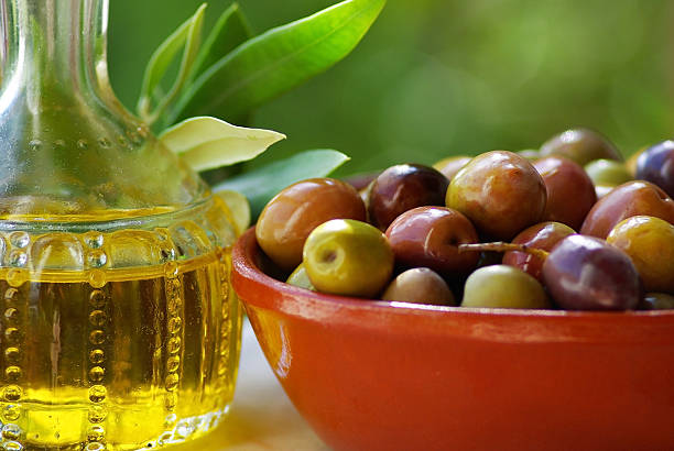 istock Olive oil and mature olives. 452048971