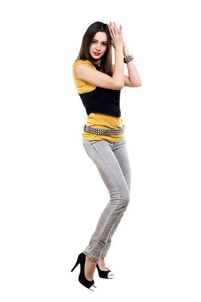 istock Woman posing in grey jeans 452049611