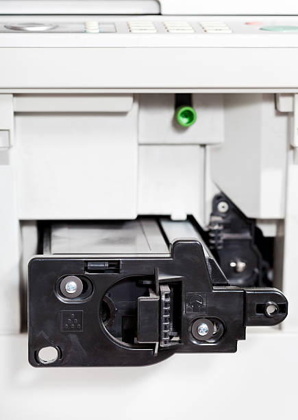 istock insert of toner cartridge in office copier 452068767