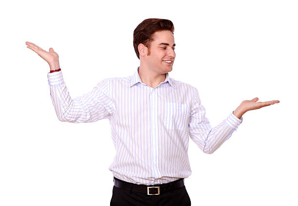 istock Handsome young man holding out his palms 452074395