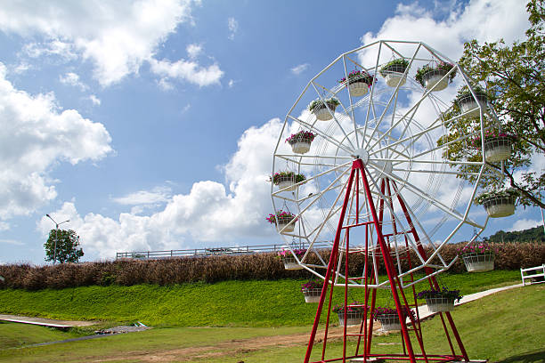 istock Ferris wheel with basket of flowers 452074887