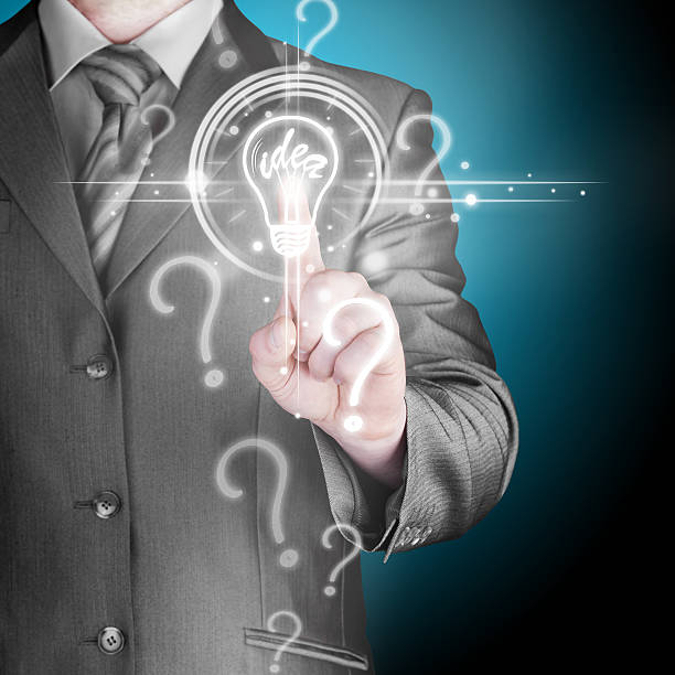 istock Business man touching light of idea 452075109