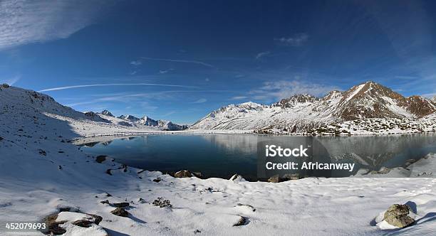 First Snow In Autumn Panorama Hirschebensee Tyrol Austria Stock Photo - Download Image Now