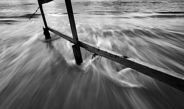 istock Waves flowing through wooden fence 452082793
