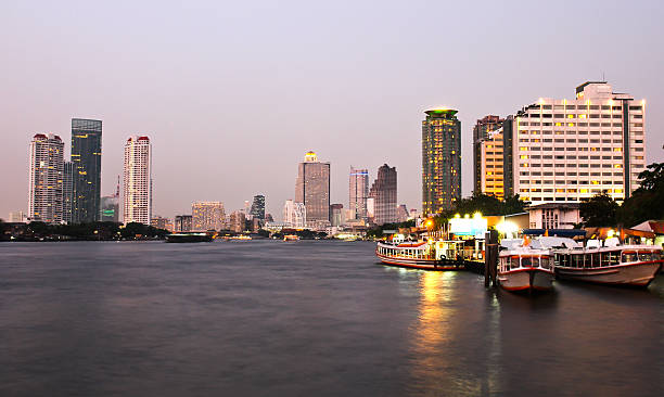 istock Buildings along the river at sunset. View from Asiatique. 452094451