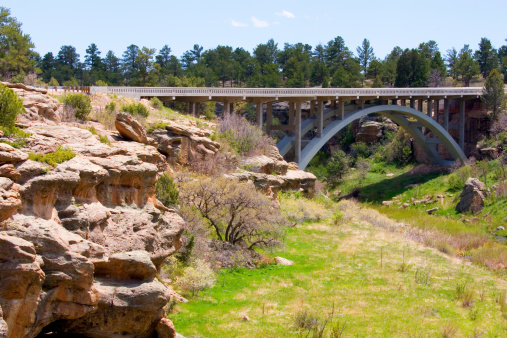 Beautiful bridge over Castlewood Canyon and Cherry Creek on highway 83 in Douglas County Colorado on a spring morning.
