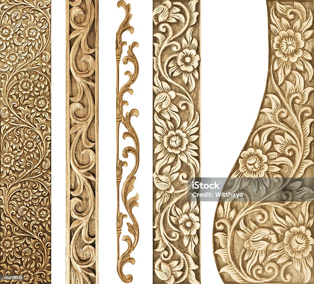 Flower designs in wooden carving Pattern of flower carved on white background Abstract Stock Photo