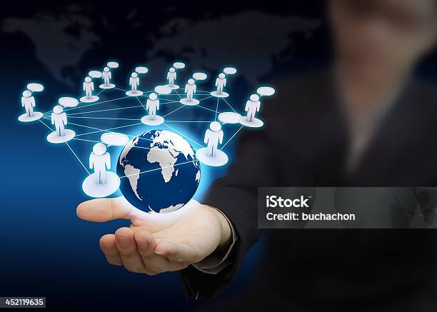 Holding A Glowing Earth Globe In His Hands Stock Photo - Download Image Now - Backgrounds, Blue, Business