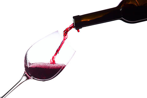 istock Sparkling red wine being poured into wine glass 452121015