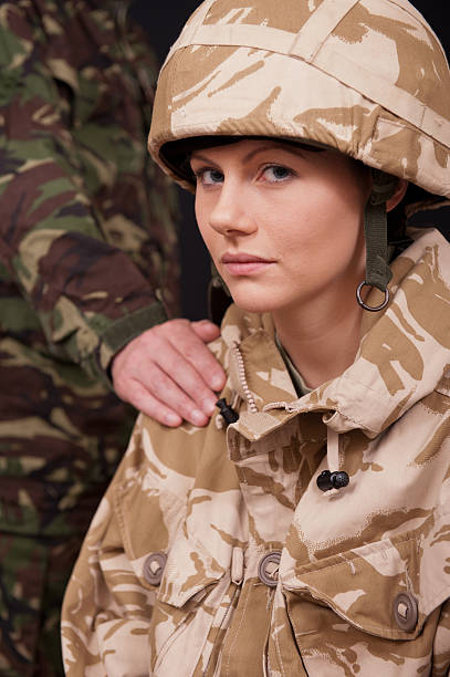 istock Female Soldier Being Comforted 452126113