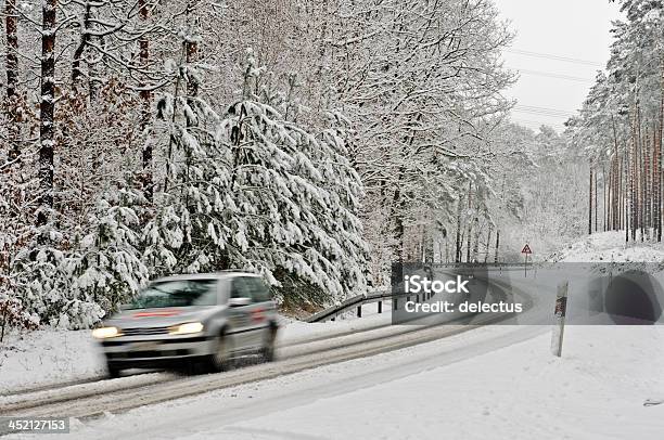 Traffic On A Wintry Road Stock Photo - Download Image Now - Brandenburg State, Car, Country Road