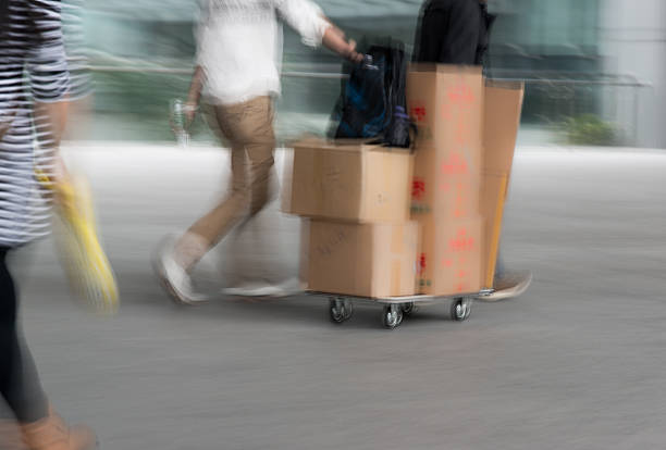 istock people delivery goods with dolly 452127259