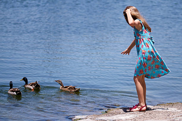 istock Girl and duck 452144775
