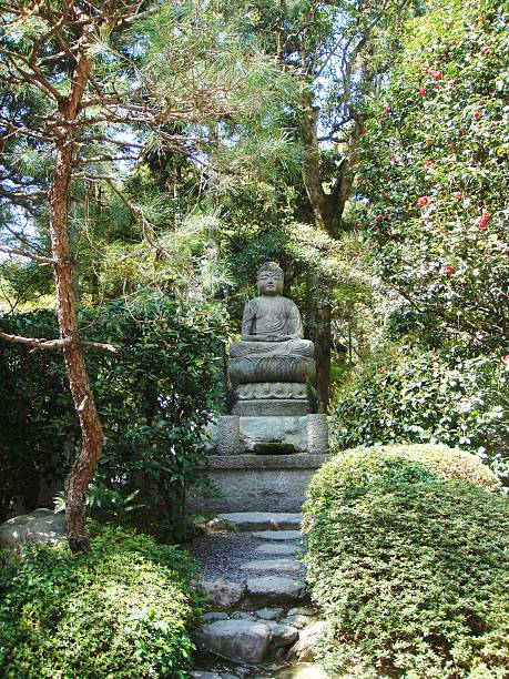 istock Japanese garden with Buddha statue 452147315