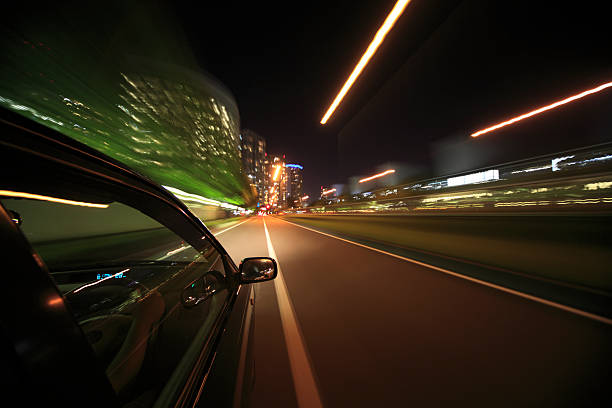 istock Night drive with car in motion. 452151135