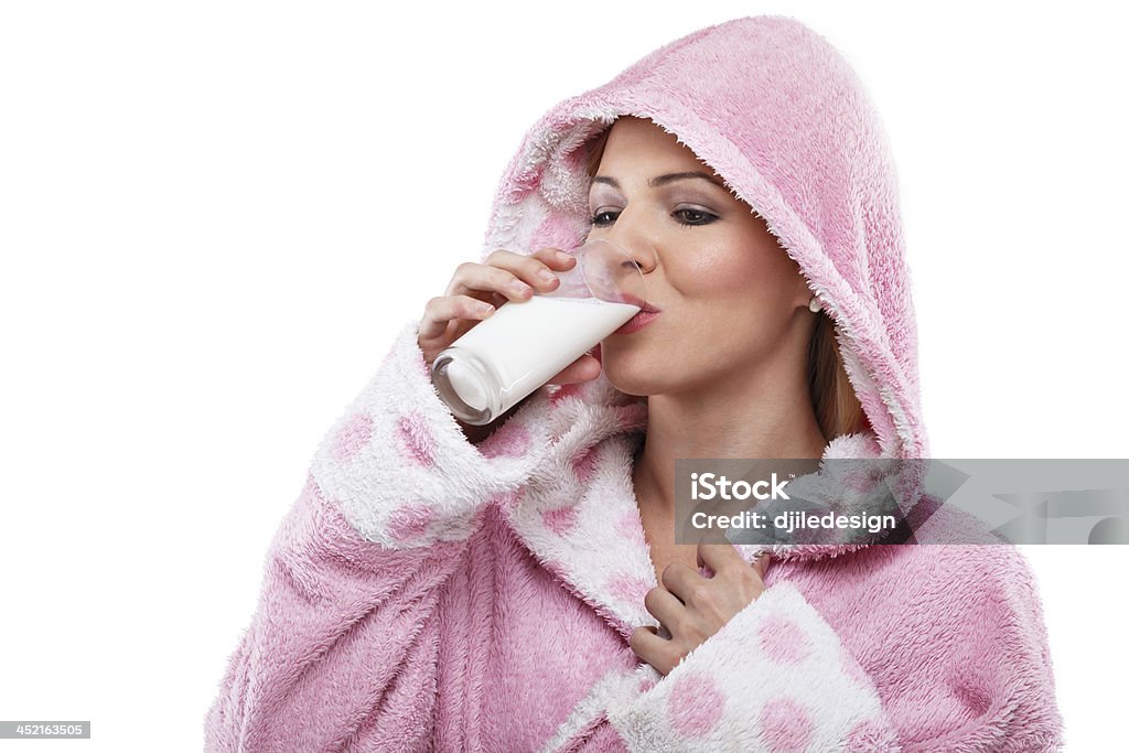 Healthy living Beautiful blonde girl in a bathrobe drinking milk 20-29 Years Stock Photo