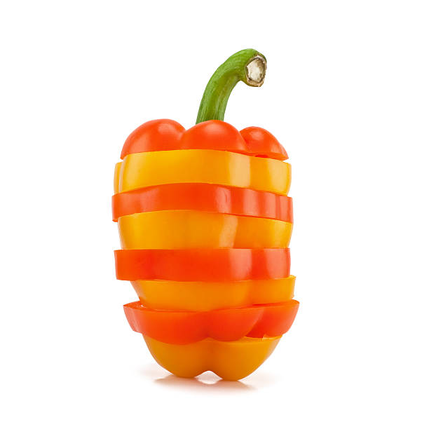 istock orange and yellow peppers cut into circles 452167695