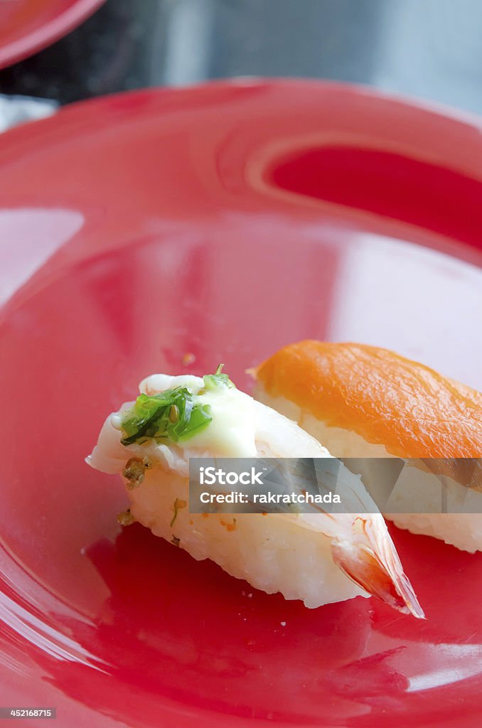 sushi su di un piatto - Foto stock royalty-free di Bianco