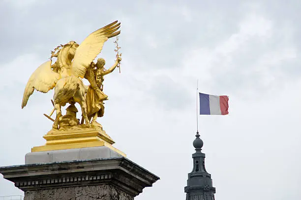 Golden decorations of the Alexander III bridge in Paris