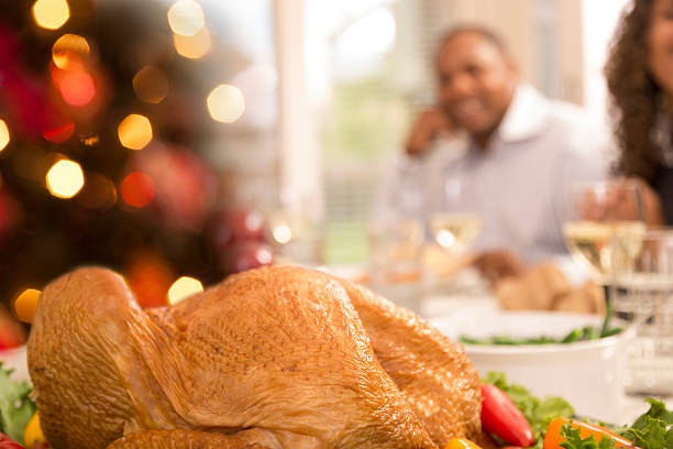 istock Food:  Family prepares to enjoy Christmas dinner. 452179417