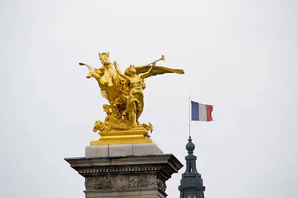 Golden decorations of the Alexander III bridge in Paris