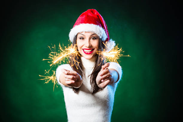 istock Beautiful female with sparkler 452179665