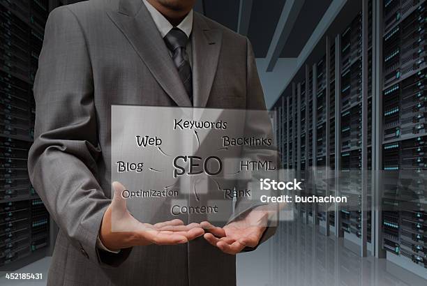 Business Man Hand Shows Virtual Screen Of Seo Diagram Stock Photo - Download Image Now