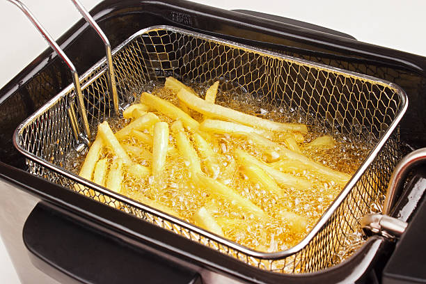 istock Cooking french fries 452187693