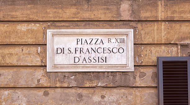 Piazza di san Francesco d'Assisi street name sign, Rome Italy Piazza di San Francesco d'Assisi street name sign, Rome Italy street name sign stock pictures, royalty-free photos & images