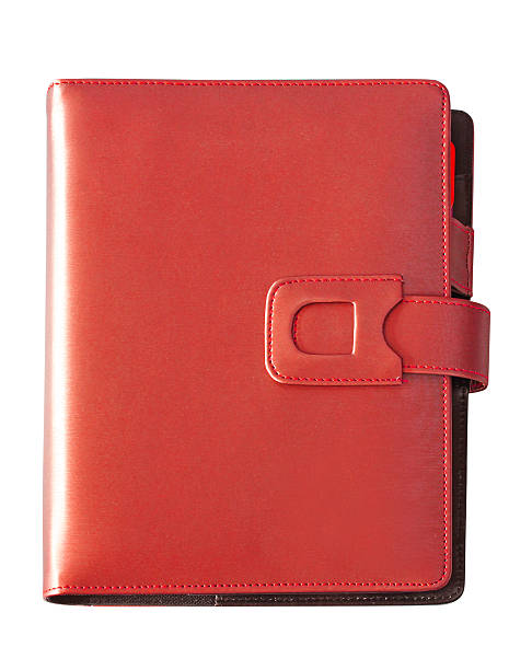 istock Leather red cover notebook isolated on white background 452193223